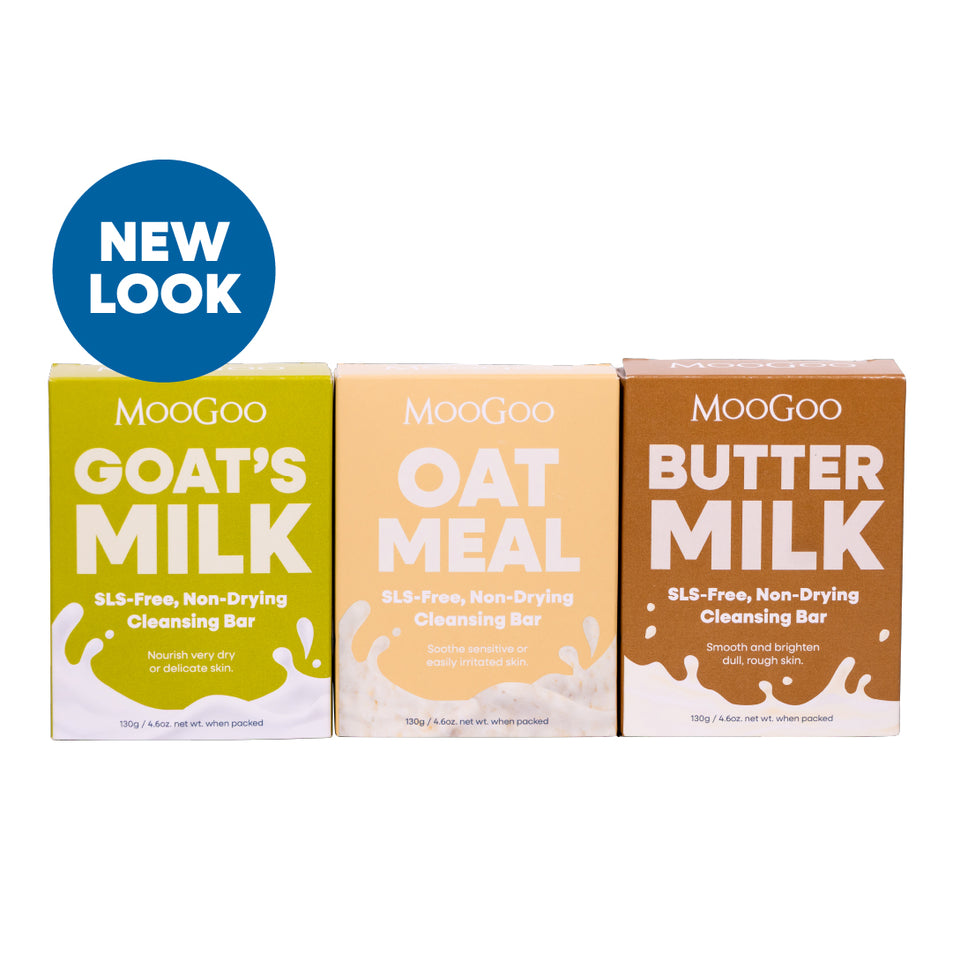 Three MooGoo soap bars in different flavors with a 'New Look' label on a white background. With Buttermilk, Oatmeal and Goat’s Milk, non-drying soap bars for sensitive and dry skin SLS-free. 
