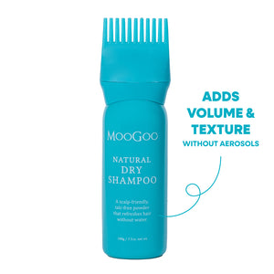 A turquoise blue bottle of MooGoo Natural Dry Shampoo with a matching wide-tooth comb applicator on top, shown on a white background. 