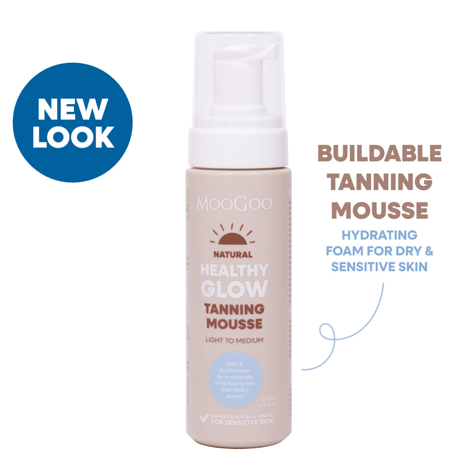 MooGoo Natural Tanning Mousse on white background, natural self tan mousse for streak-free, sunless bronzed skin, free from parabens and harsh chemicals.